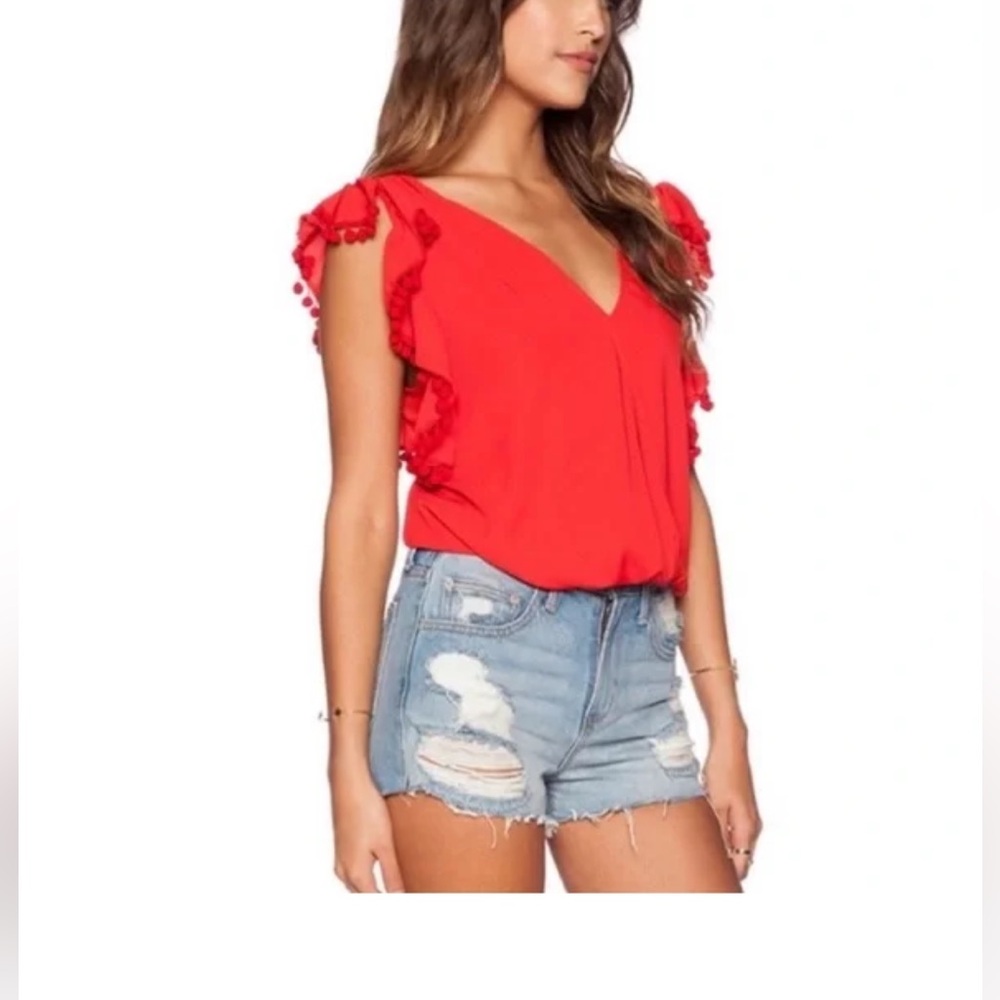 The Dorthy Ruffle Top by VaVa by Joy Han from Revolve in red.